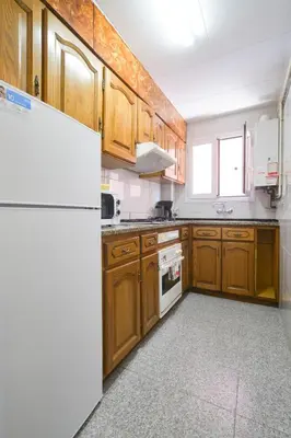 Una cocina o zona de cocina en Apartamento de diseño equipado céntrico moderno