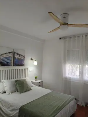 Cama o camas de una habitación en Apartament familiar tranquil a Platja d'Aro
