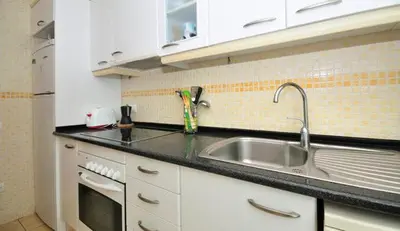 Una cocina o zona de cocina en Fantástico apartamento