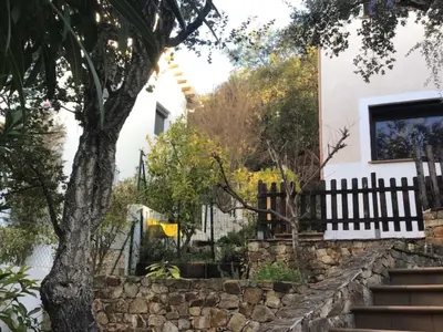 Jardín al aire libre en Sunny Costa Brava Getaway with Big Private Terrace