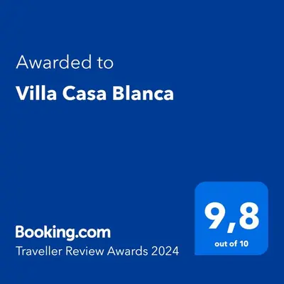 Certificado, premio, señal o documento que está expuesto en Villa Casa Blanca
