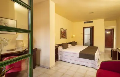 Cama o camas de una habitación en Hotel Guitart Rosa - Adults Only