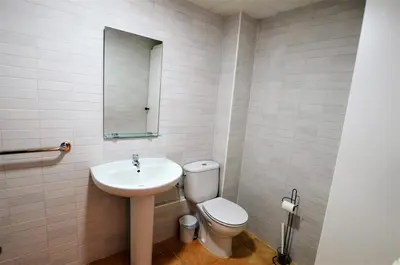 Un baño de VILLA FLORES 8 personas LLORET DE MAR