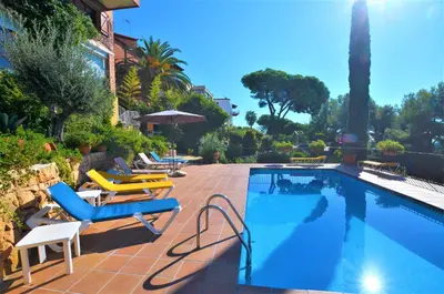 Piscina en o cerca de VILLA FLORES 8 personas LLORET DE MAR