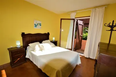 Cama o camas de una habitación en VILLA FLORES 8 personas LLORET DE MAR