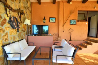 Una televisión o centro de entretenimiento en VILLA FLORES 8 personas LLORET DE MAR