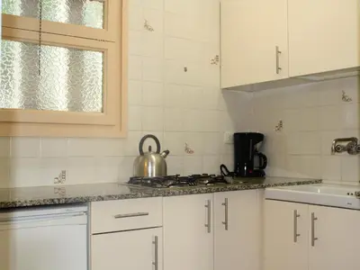 Una cocina o zona de cocina en Apartaments Margarita Sabina Pinell