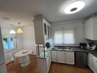 Una cocina o zona de cocina en Villa Marta - Girona