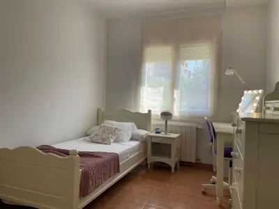 Cama o camas de una habitación en Villa Marta - Girona