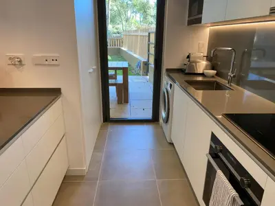 Una cocina o zona de cocina en Apartamento nuevo, equipado y decorado con estilo