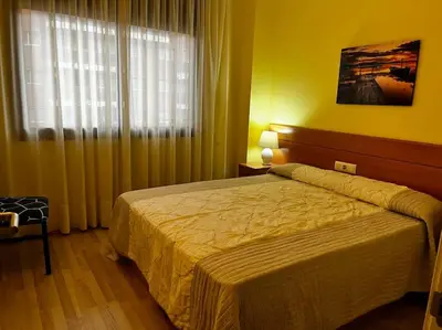 Cama o camas de una habitación en Hermoso apartamento con piscina a 300m de la playa