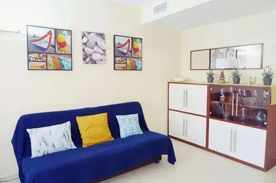 Zona de estar de Precioso apartamento con piscina y jardín propio