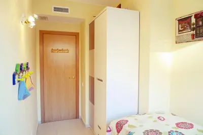 Cama o camas de una habitación en Precioso apartamento con piscina y jardín propio