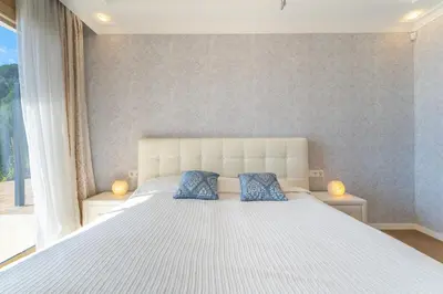 Cama o camas de una habitación en Gran Piscina Hidromasaje playa privada y sauna