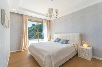 Cama o camas de una habitación en Gran Piscina Hidromasaje playa privada y sauna