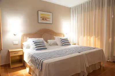 Cama o camas de una habitación en DWO Les Palmeres
