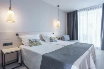 Cama o camas de una habitación en DWO Les Palmeres