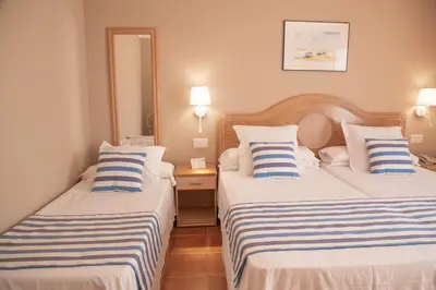 Cama o camas de una habitación en DWO Les Palmeres