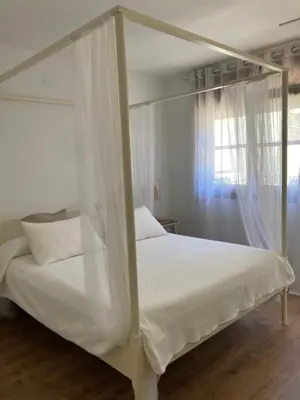 Cama o camas de una habitación en Apartamento céntrico, climatizado y totalmente equipado de 3 habitaciones para 6-7 personas