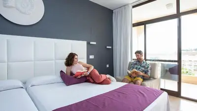 Cama o camas de una habitación en Evenia Olympic Garden