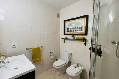 Un baño de Mediterranean house, beach and charm garden