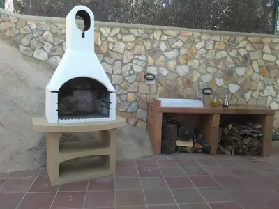 Barbacoa disponible para clientes en la villa