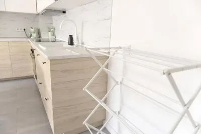 Una cocina o zona de cocina en Apartamento con Parking a 50m de la playa