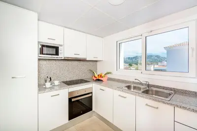 Una cocina o zona de cocina en Apartaments Condado by Marsol
