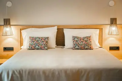 Cama o camas de una habitación en htop Amatista #htopBliss