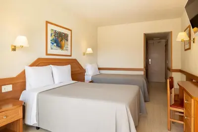 Cama o camas de una habitación en htop Royal Star & SPA #htopFun