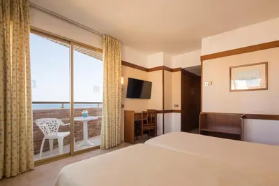 Cama o camas de una habitación en htop Royal Sun #htopFun