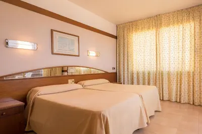 Cama o camas de una habitación en htop Royal Sun #htopFun