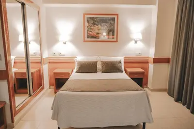 Cama o camas de una habitación en htop Pineda Palace 4Sup - Adults Only #htopBliss