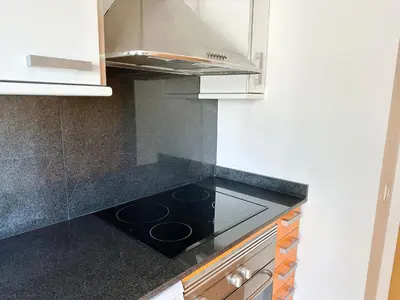 Una cocina o zona de cocina en NEW! Apartamento con 2 piscinas, parque infantil, a 1 min de la playa