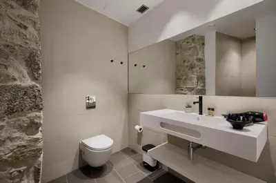 Un baño de Gaia Apartments & Lofts Girona