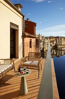 Un balcón o terraza de Gaia Apartments & Lofts Girona