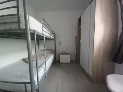 Cama o camas de una habitación en Apartaments L´AMFORA