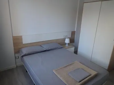 Cama o camas de una habitación en Apartaments L´AMFORA