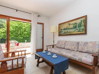 Zona de estar de Apartment S'Esquirols Nº8 by Interhome