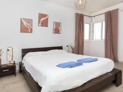 Cama o camas de una habitación en Holiday Home Floradise by Interhome