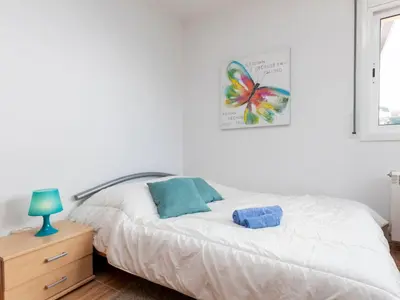 Cama o camas de una habitación en Holiday Home Floradise by Interhome