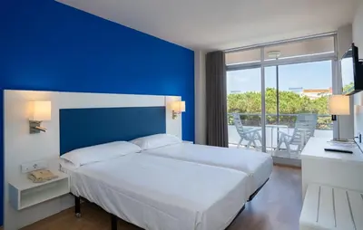 Cama o camas de una habitación en Medplaya Hotel Monterrey
