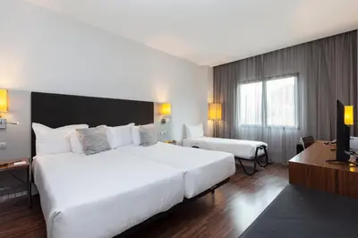 Cama o camas de una habitación en Hotel Palau de Bellavista Girona by URH