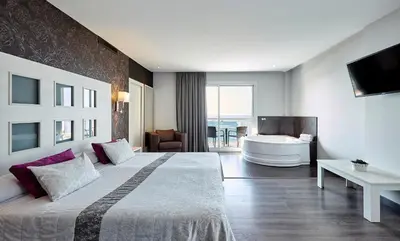 Cama o camas de una habitación en Hotel Surf Mar
