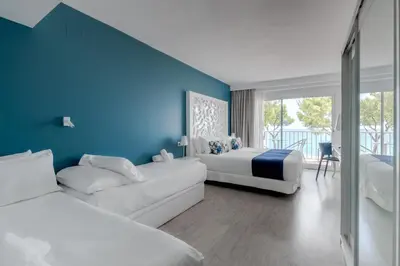 Cama o camas de una habitación en Hotel Planamar by Escampa Hotels