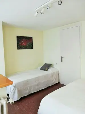 Cama o camas de una habitación en Apartamento Lina, a 20 metros de la playa