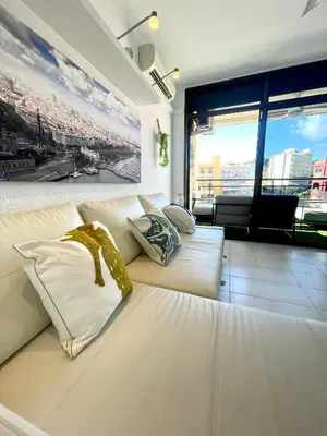 Zona de estar de Apartemento piscina centro calella 3 min playa