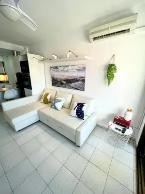 Zona de estar de Apartemento piscina centro calella 3 min playa