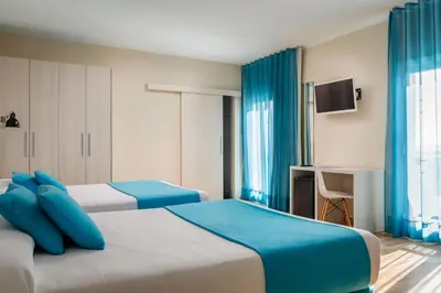 Cama o camas de una habitación en ALEGRIA Maripins
