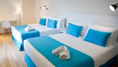 Cama o camas de una habitación en ALEGRIA Maripins